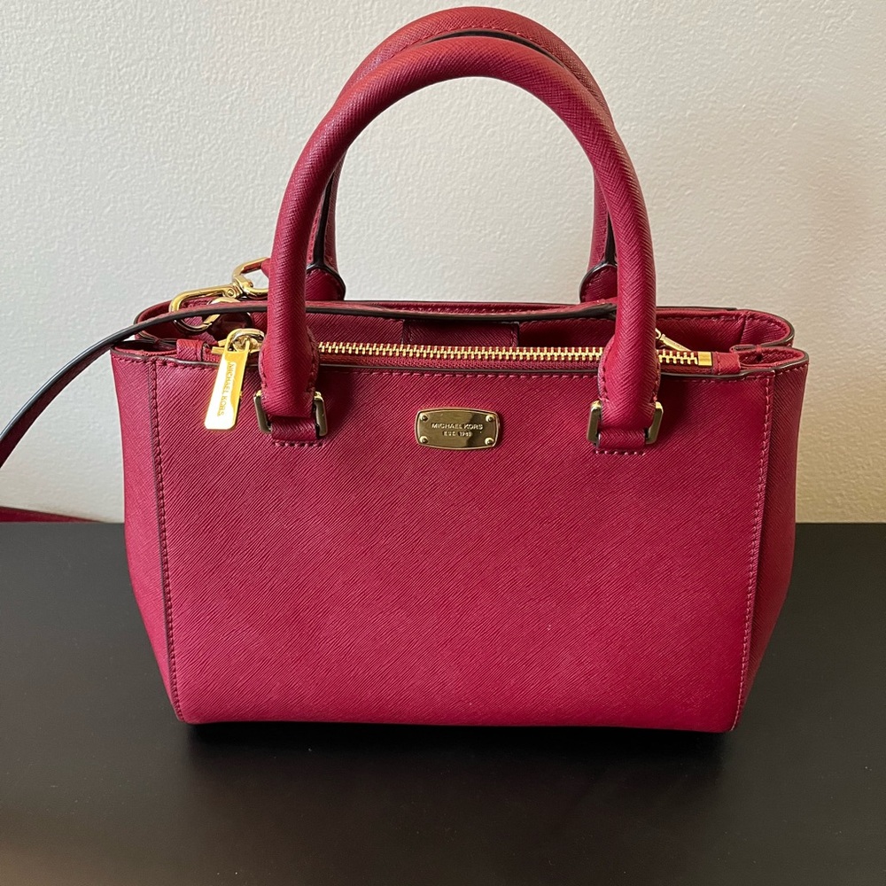 Michael Kors Mulberry color purse, crossbody and hand straps